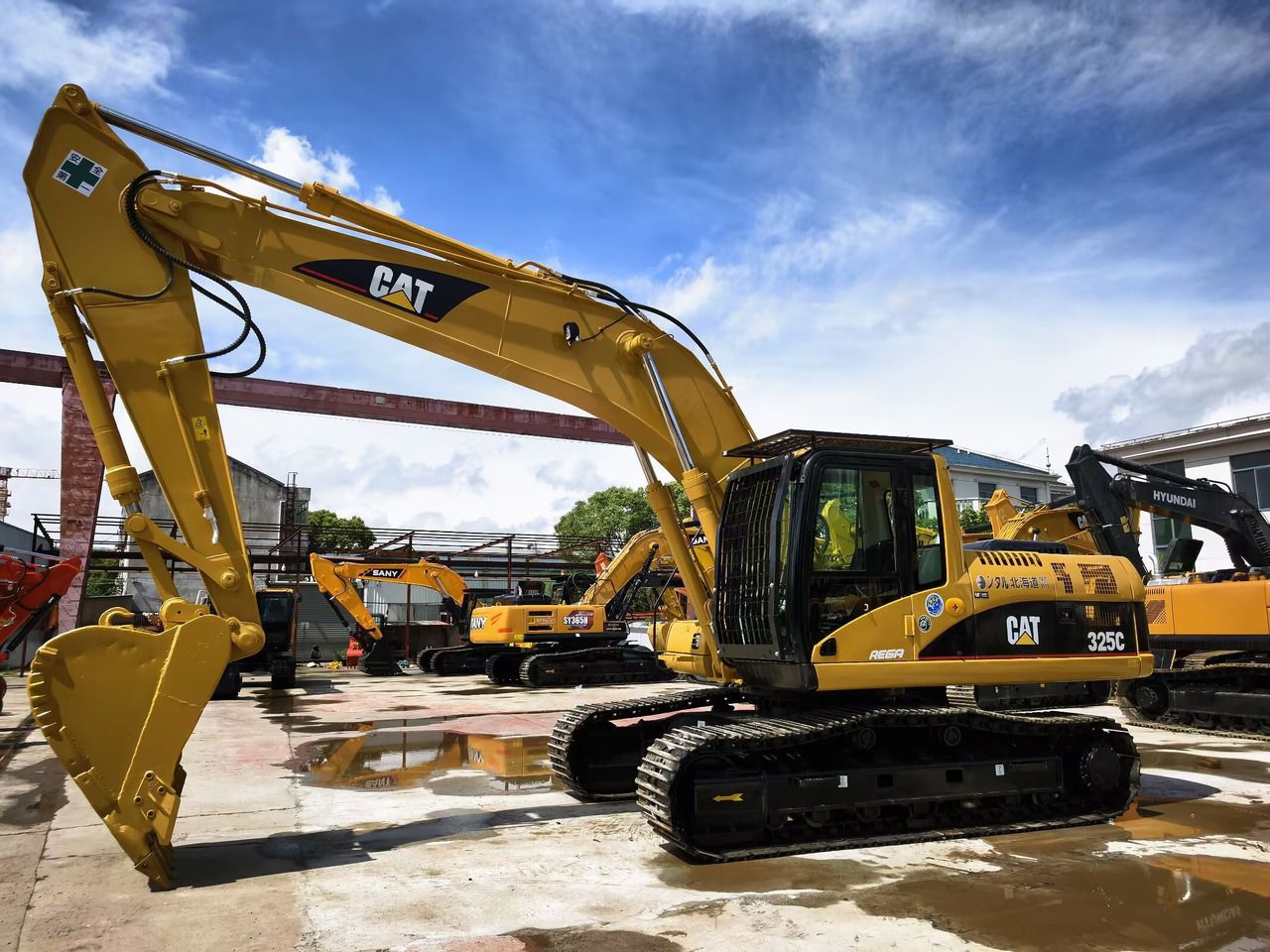 2023 Caterpillar 325C crawler excavator, side profile view