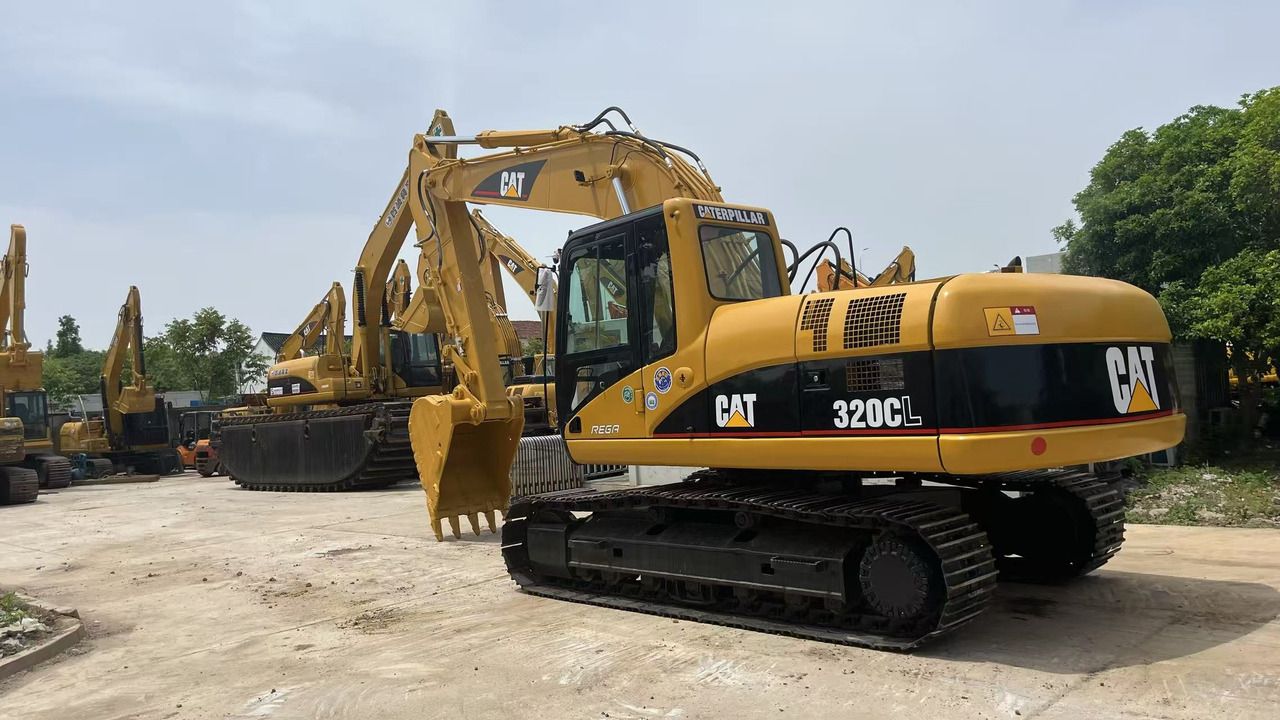 2020 Caterpillar 320CL crawler excavator, rear three-quarter view