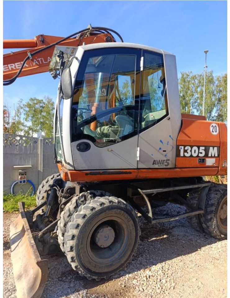 2006 Atlas 1305 M wheel excavator side view