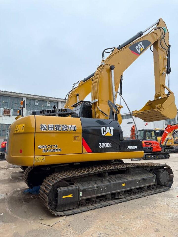 2025 Caterpillar 320D2 crawler excavator, rear three-quarter view 2025 Caterpillar 320D2 crawler excavator, rear three-quarter view