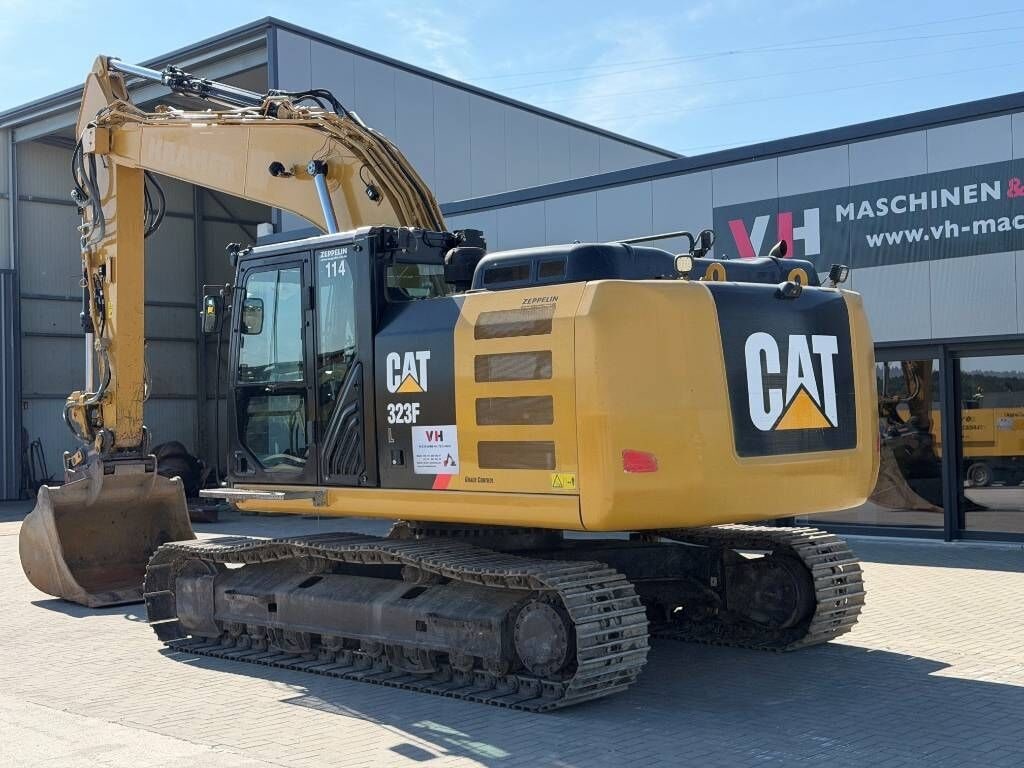 2017 Caterpillar 323FL crawler excavator, rear three-quarter view