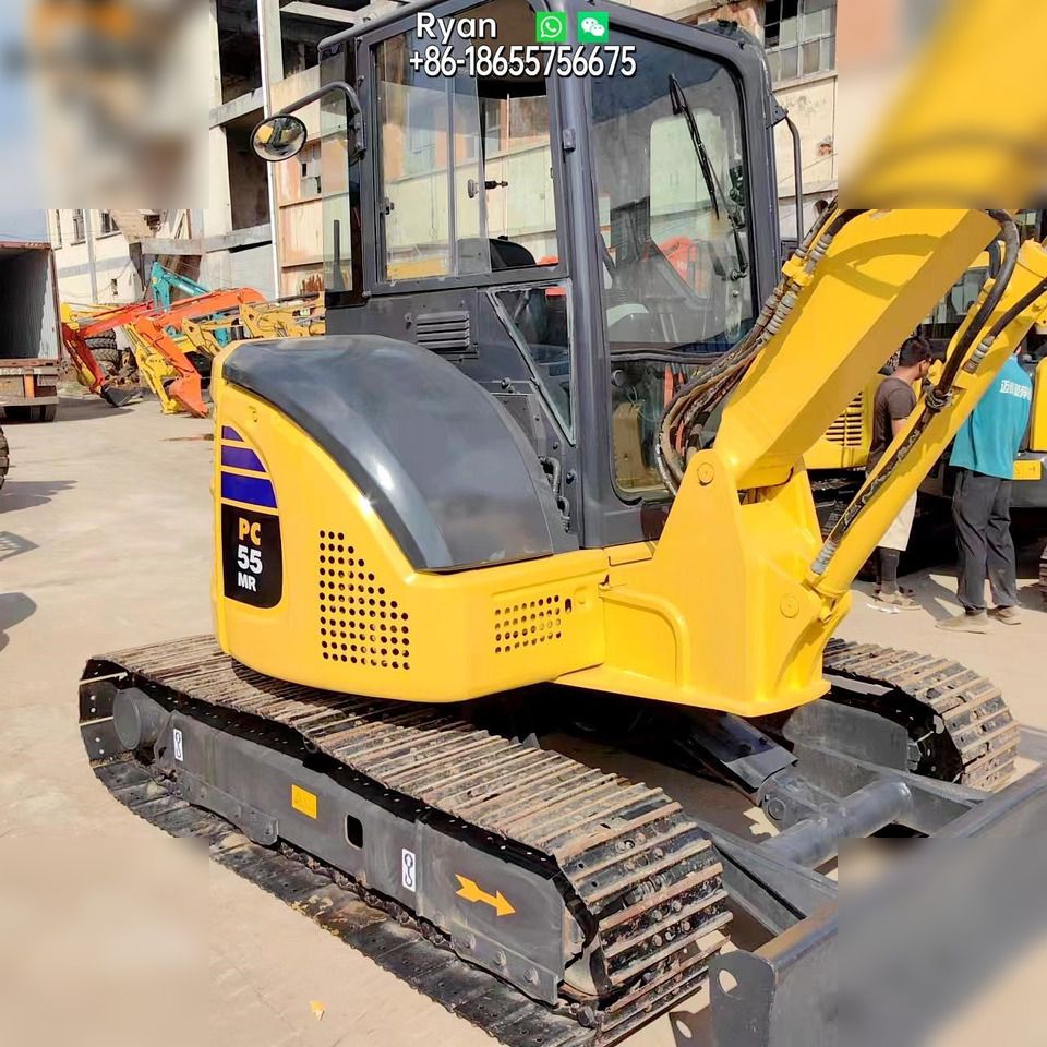 Komatsu PC55MR-2 mini excavator, rear three-quarter view