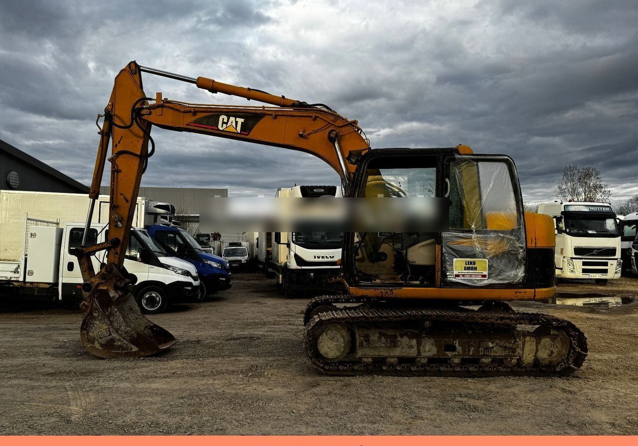 2005 Caterpillar 311C crawler excavator, side view