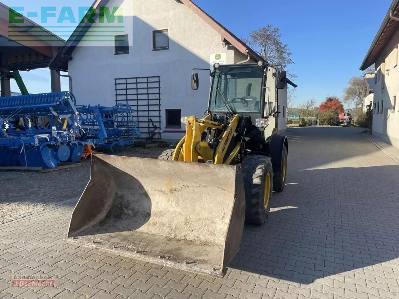 2016 Komatsu WA80M-7 wheel loader, front three-quarter view 2016 Komatsu WA80M-7 wheel loader, front three-quarter view