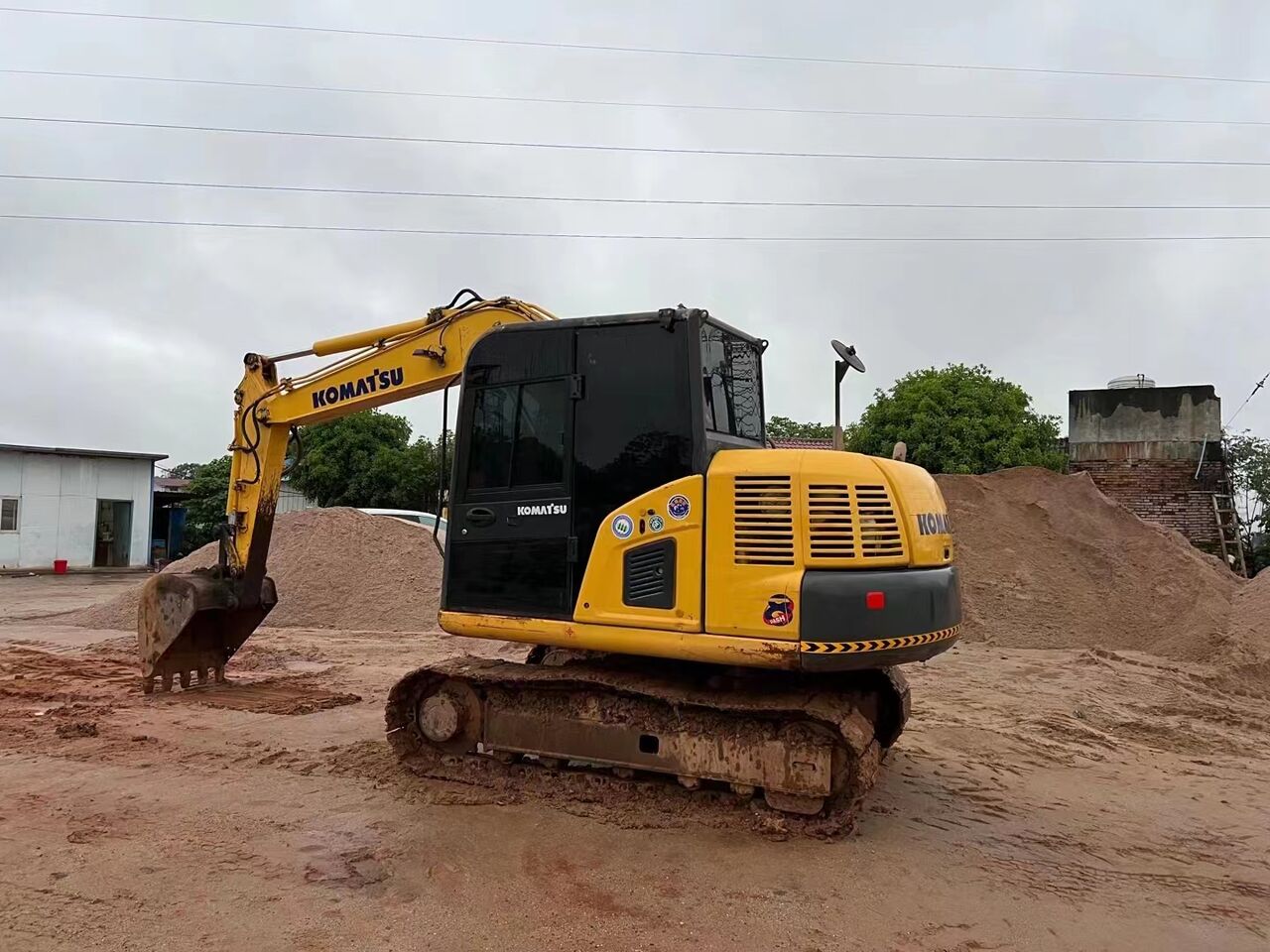 2023 Komatsu PC60-8 mini excavator, rear three-quarter view