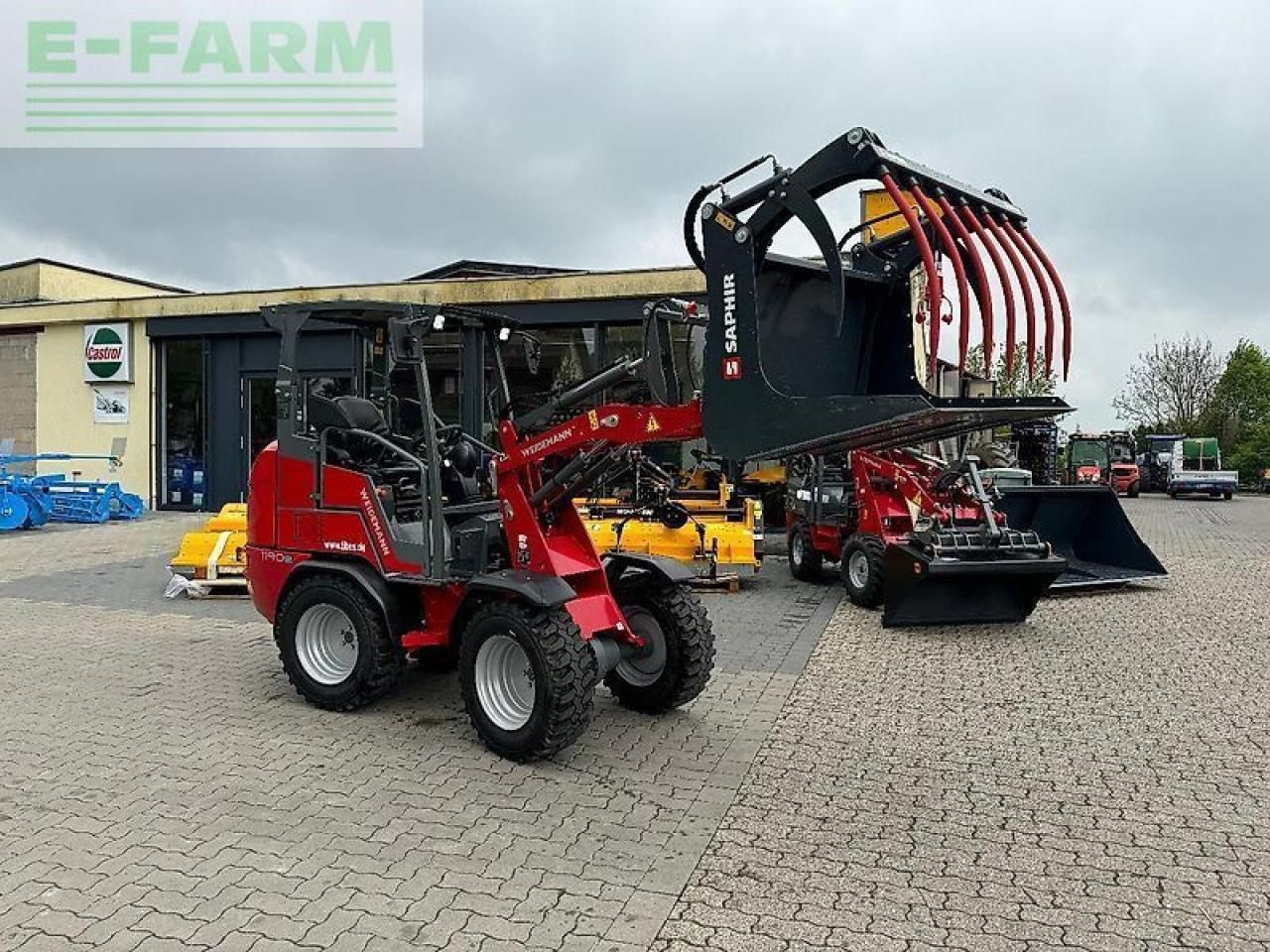 2023 Weidemann 1190E wheel loader with grapple attachment, side view 2023 Weidemann 1190E wheel loader with grapple attachment, side view