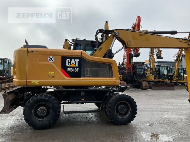 2015 Caterpillar M318F wheel excavator side view
