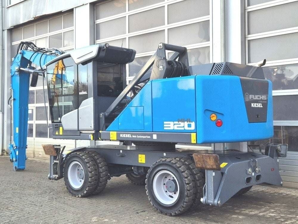 2023 Fuchs MHL320F material handler, side view