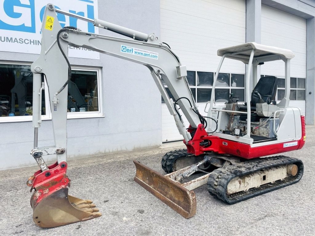 2005 Takeuchi TB135 mini excavator, side view