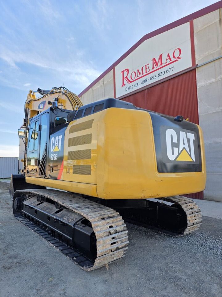 2015 Caterpillar 329E crawler excavator, rear three-quarter view