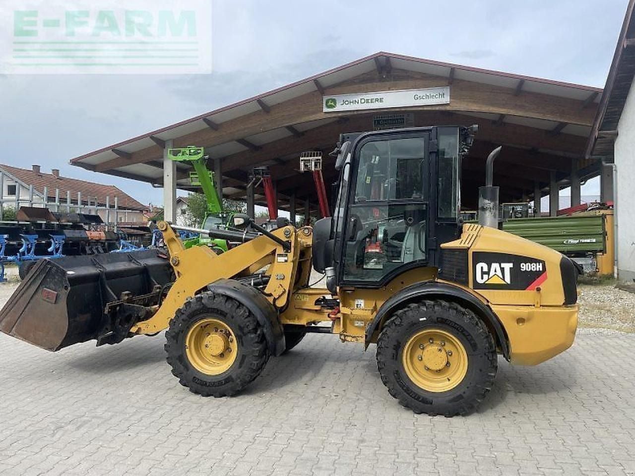 2011 Caterpillar 908H wheel loader, side view