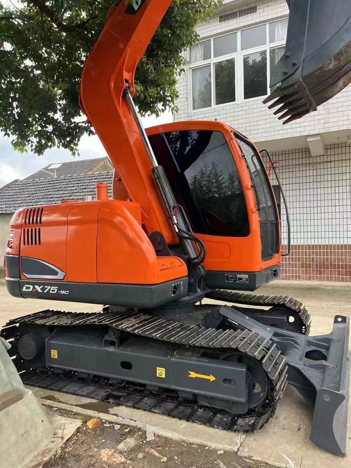 Doosan DX75-9C mini excavator, side view Doosan DX75-9C mini excavator, side view