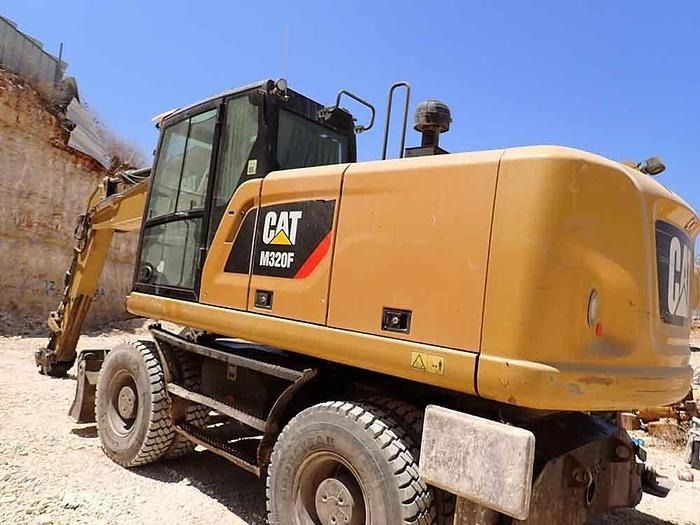 2016 Caterpillar M320F wheel excavator, rear three-quarter view