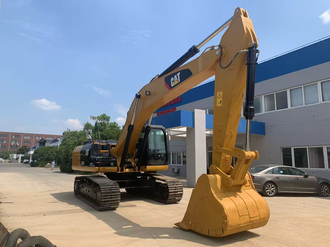 2021 Caterpillar 330D crawler excavator, front three-quarter view