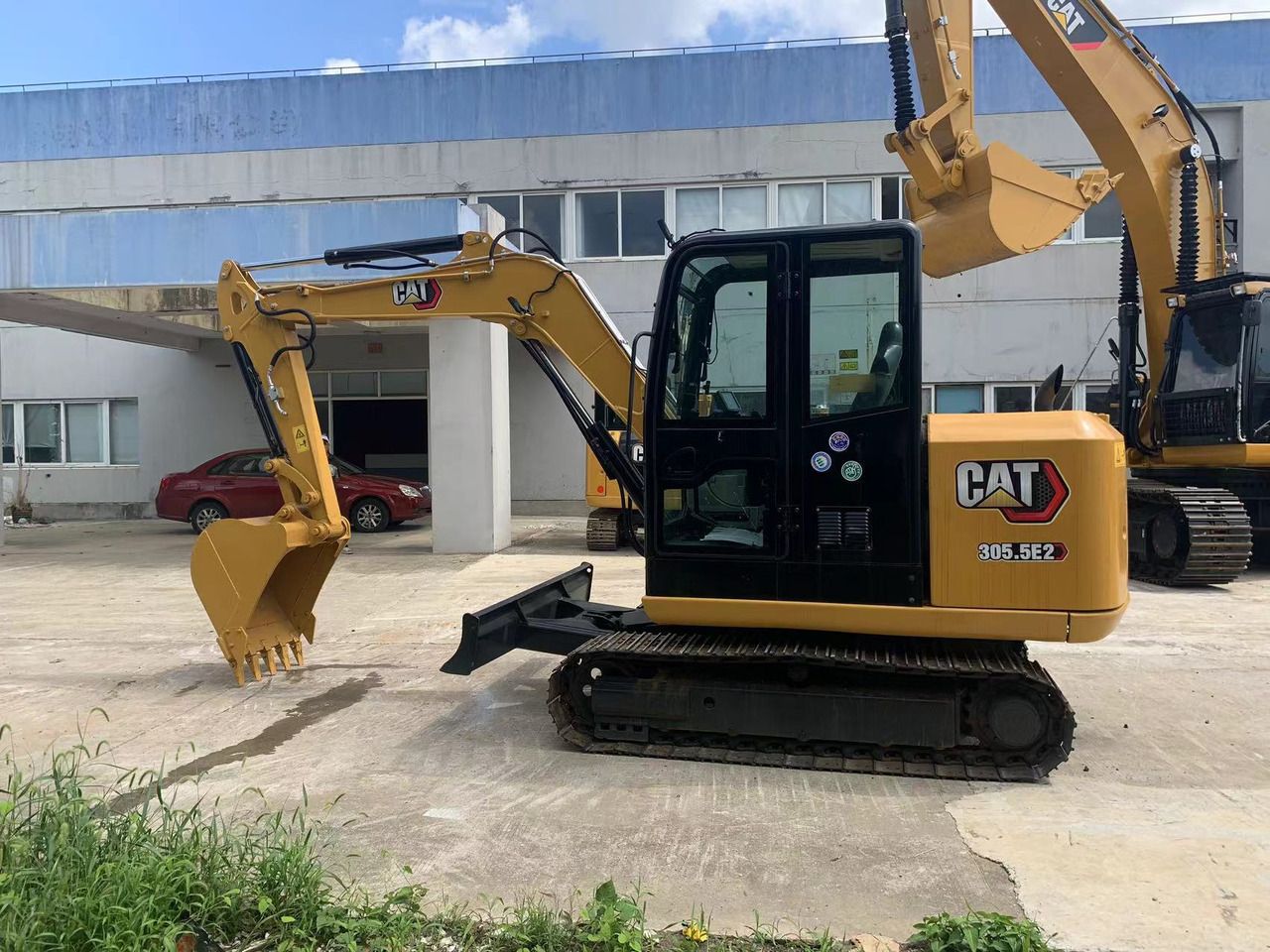2022 Caterpillar 305.5E2 mini excavator side view