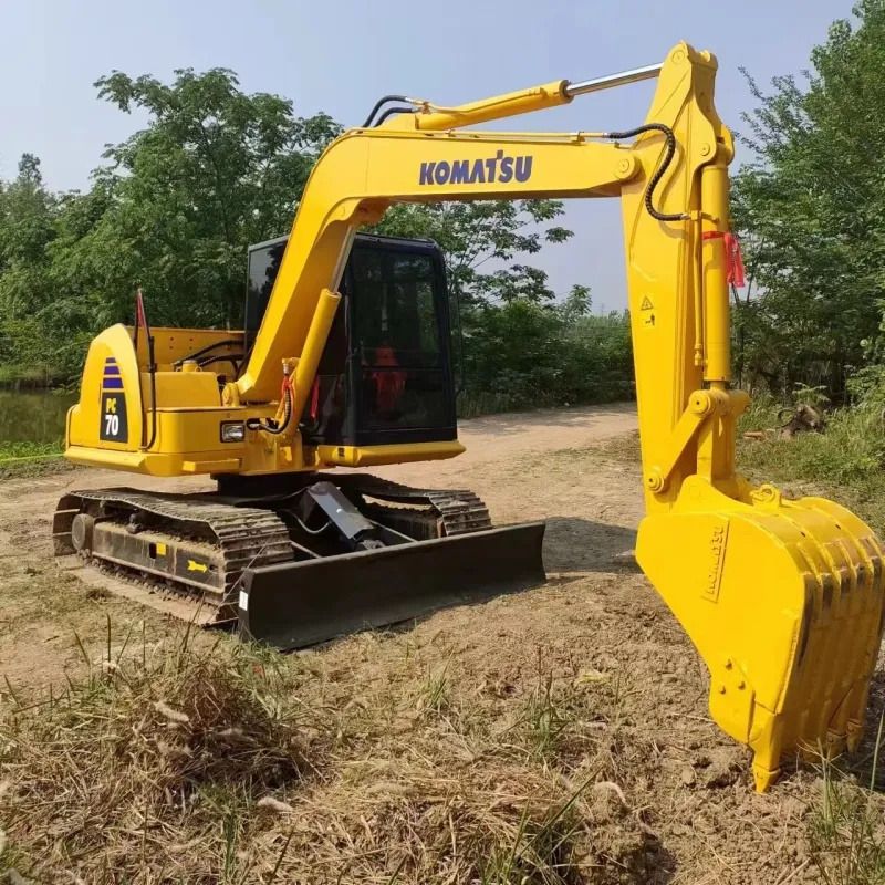 Komatsu PC70 crawler excavator, rear three-quarter view Komatsu PC70 crawler excavator, rear three-quarter view