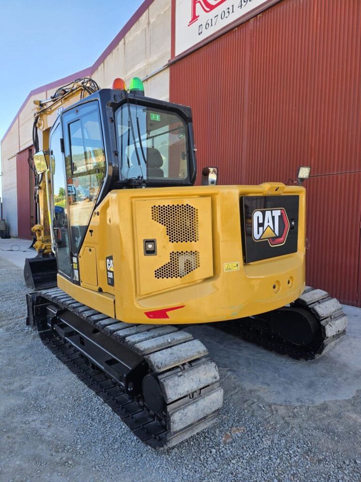 2019 Caterpillar 308 mini excavator, rear three-quarter view