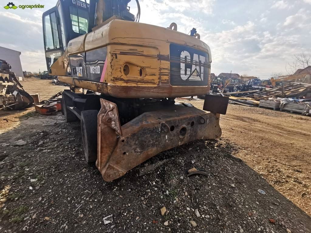 2008 Caterpillar M318D material handler rear view
