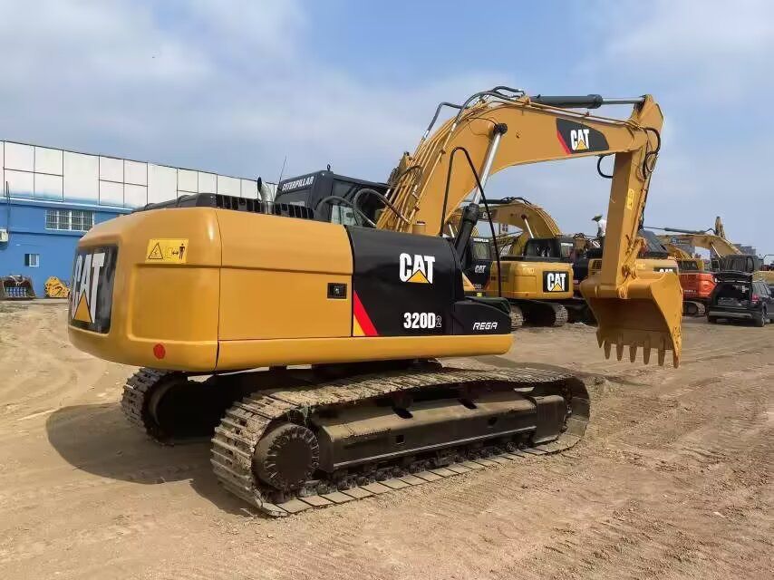 2024 Caterpillar 320D2 crawler excavator, rear three-quarter view