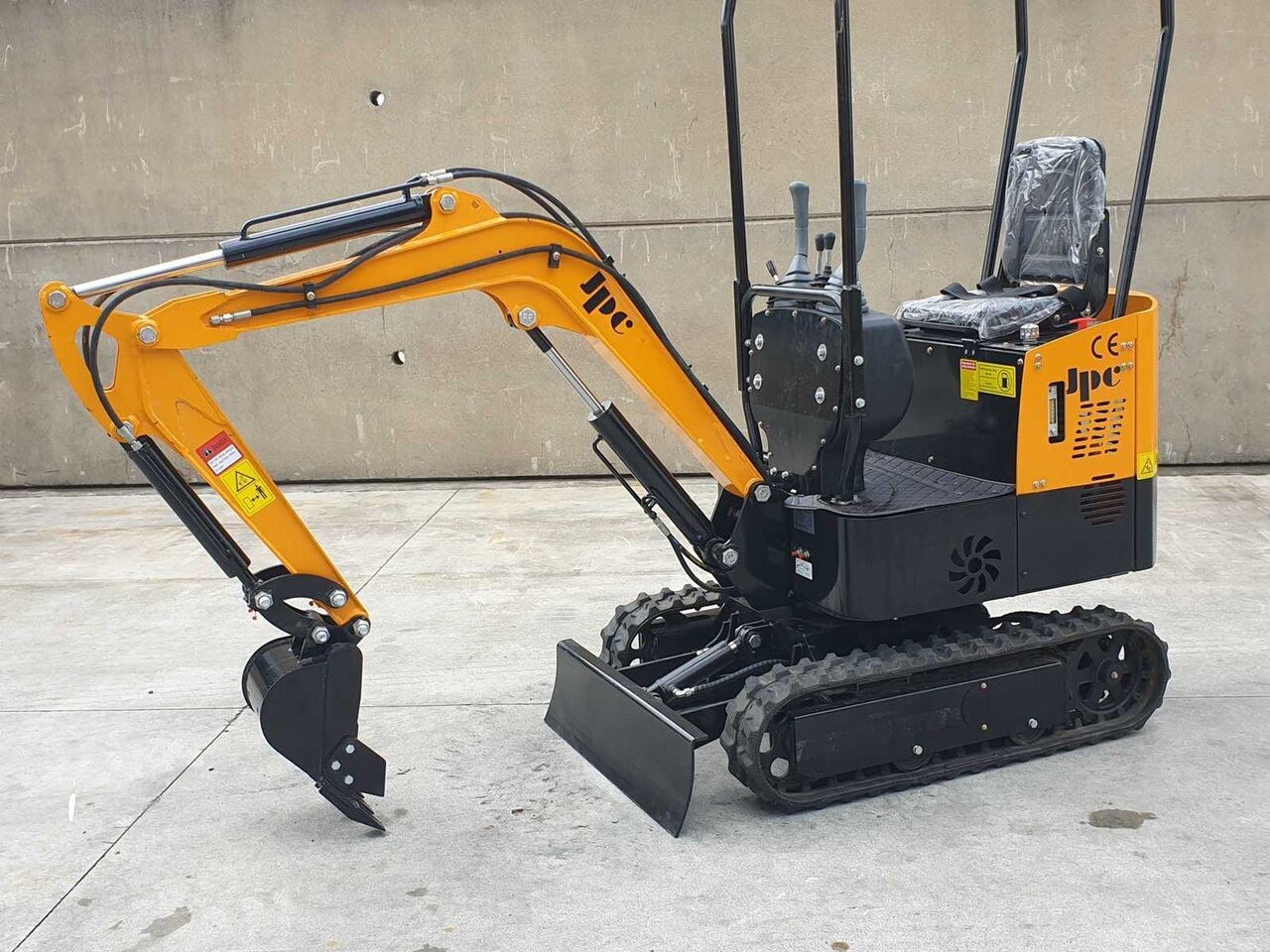 2026 JPC HT-12 mini excavator, front three-quarter view