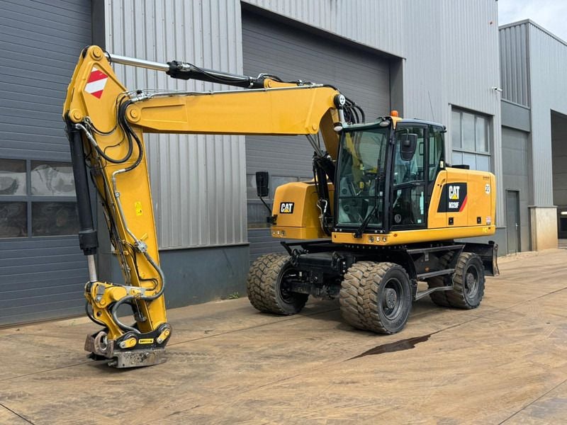 2017 Caterpillar M320F wheel excavator, side profile view