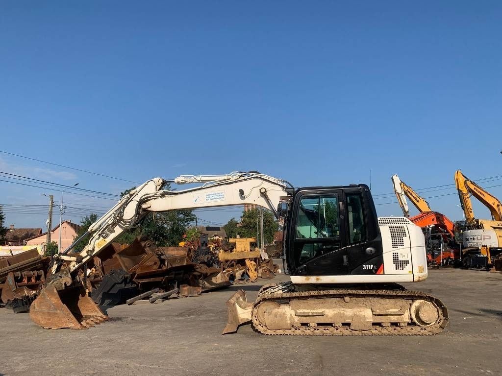 2017 Caterpillar 311FLR crawler excavator, side view