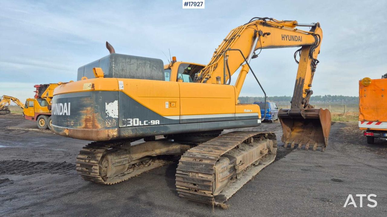 2015 Hyundai R330LC-9A crawler excavator, rear three-quarter view 2015 Hyundai R330LC-9A crawler excavator, rear three-quarter view