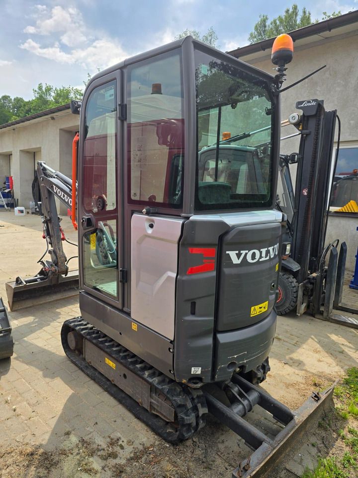 2021 Volvo EC18E mini excavator, rear three-quarter view