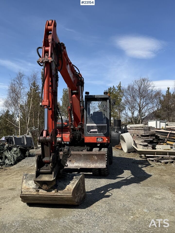1997 O&K MH CITY wheeled excavator, front view 1997 O&K MH CITY wheeled excavator, front view