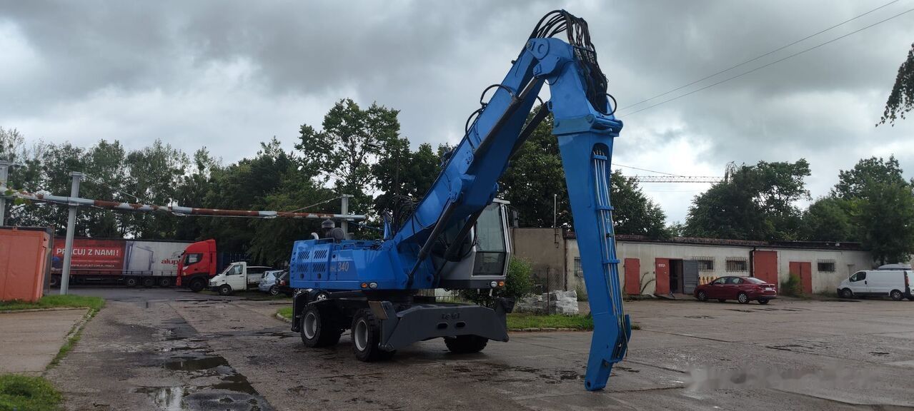 2008 Fuchs MHL340D FQC material handler, side view 2008 Fuchs MHL340D FQC material handler, side view
