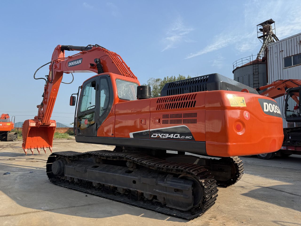2024 Doosan DX340LC-9C crawler excavator, rear three-quarter view