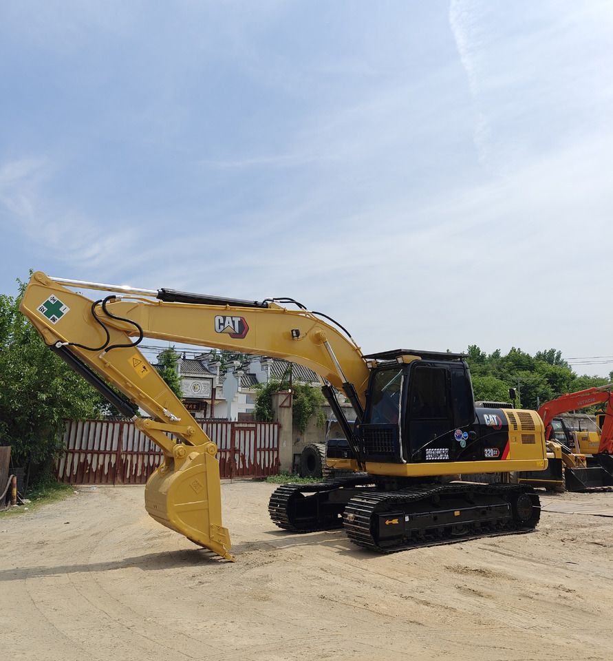 Caterpillar 320D2 del 2023, escavatore cingolato, vista laterale