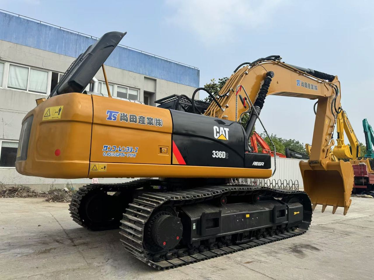 2023 Caterpillar 336D2 crawler excavator, rear three-quarter view