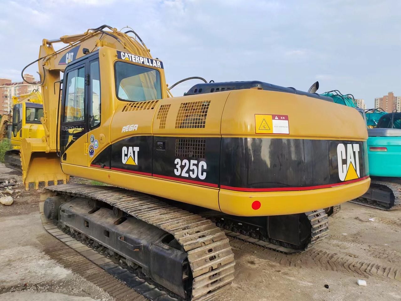 2018 Caterpillar 325C crawler excavator, rear three-quarter view