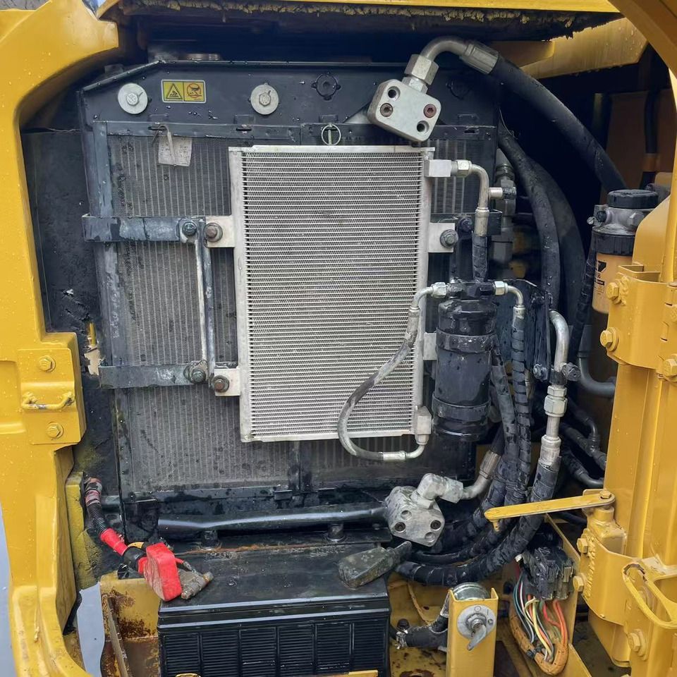 2023 Caterpillar 305.5E2 mini excavator engine compartment view