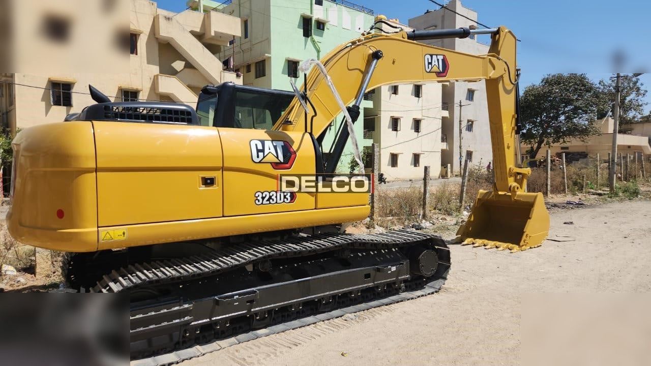 2026 Caterpillar 323D3 crawler excavator, side view 2026 Caterpillar 323D3 crawler excavator, side view