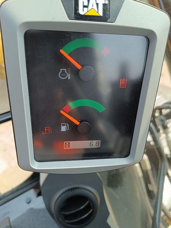 2025 Caterpillar 320D3 Crawler Excavator with a detailed view of the operator's instrument panel. 2025 Caterpillar 320D3 Crawler Excavator with a detailed view of the operator's instrument panel.