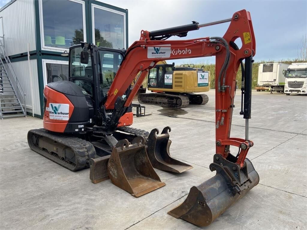 2021 Kubota U50-5 mini excavator, side view with attachments