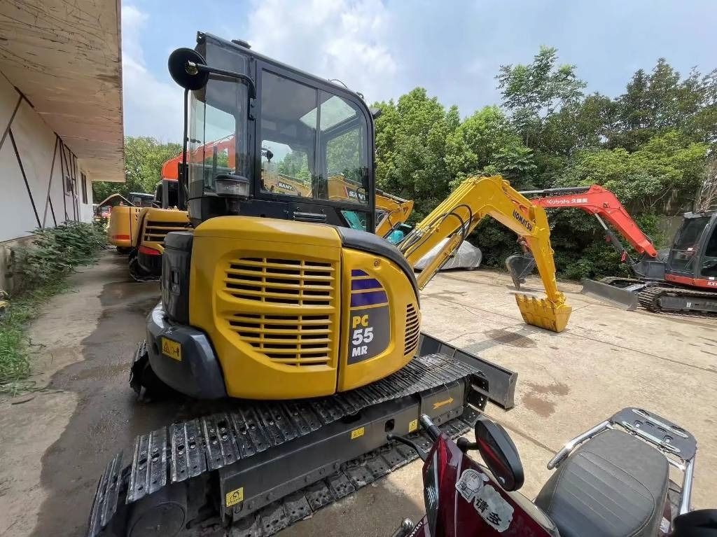2022 Komatsu PC55MR-2 mini excavator, rear three-quarter view