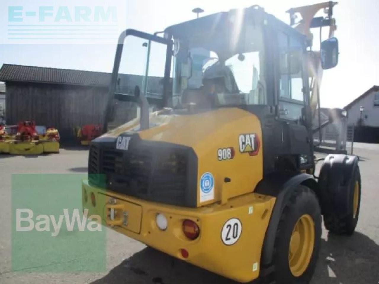 2023 Caterpillar 908 wheel loader, front three-quarter view 2023 Caterpillar 908 wheel loader, front three-quarter view