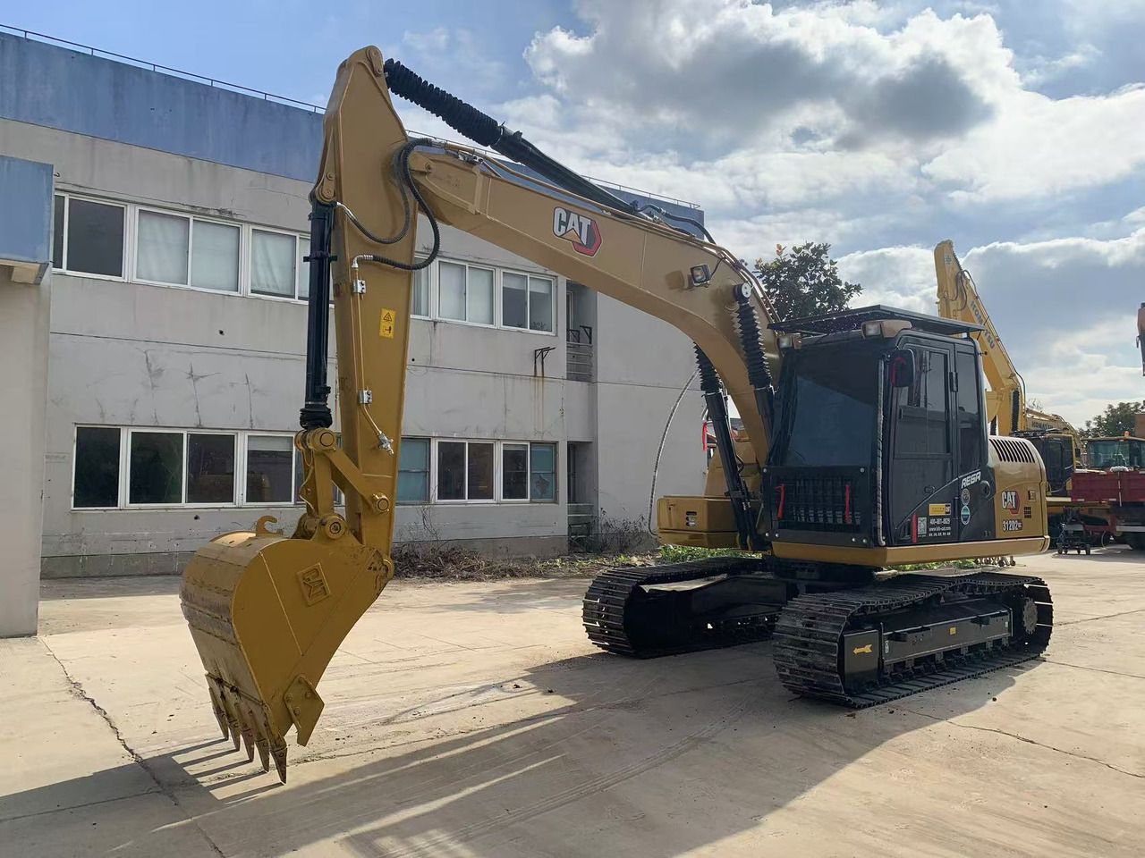 2022 Caterpillar 312D crawler excavator, side profile view