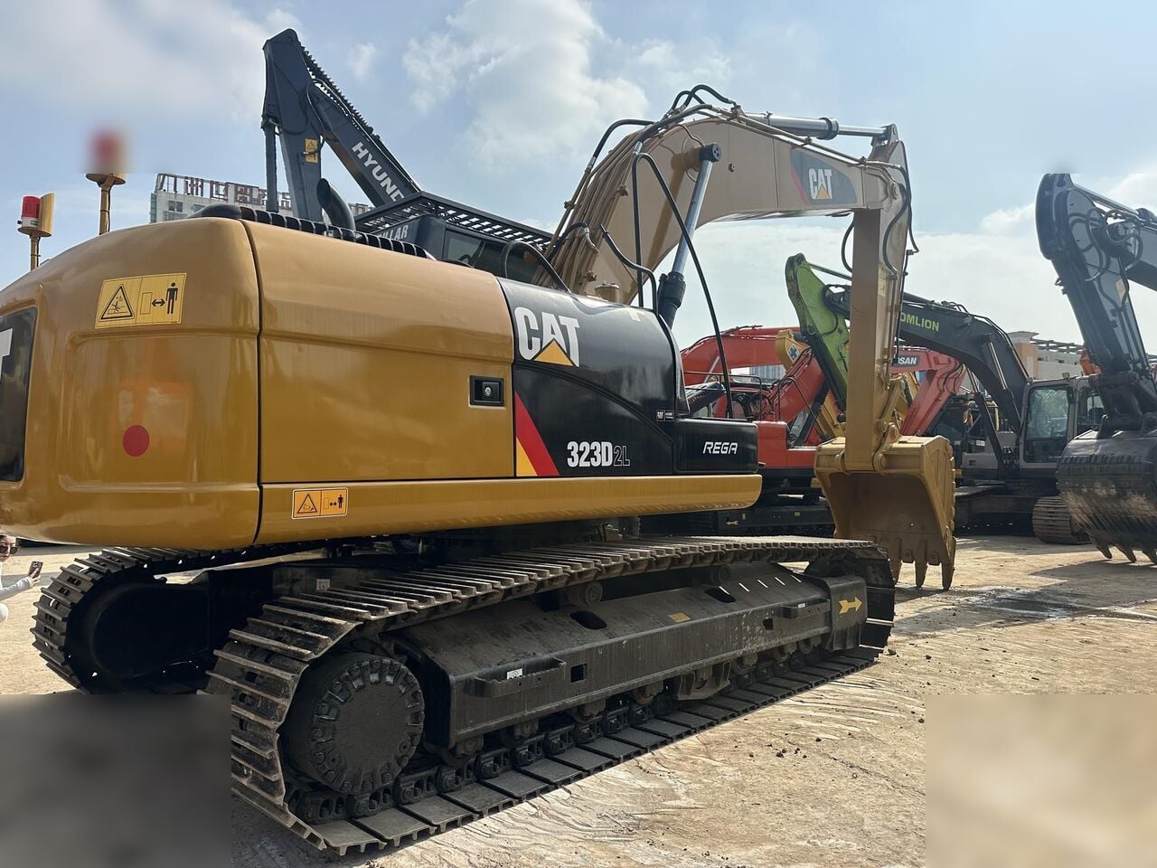 2022 Caterpillar 323D2L crawler excavator, rear three-quarter view