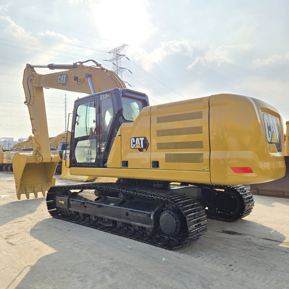 2022 Caterpillar 330GC crawler excavator, rear three-quarter view