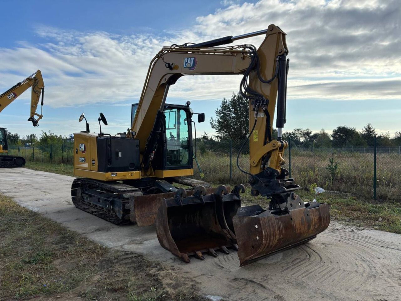 2022 Caterpillar 307.5 crawler excavator, front three-quarter view