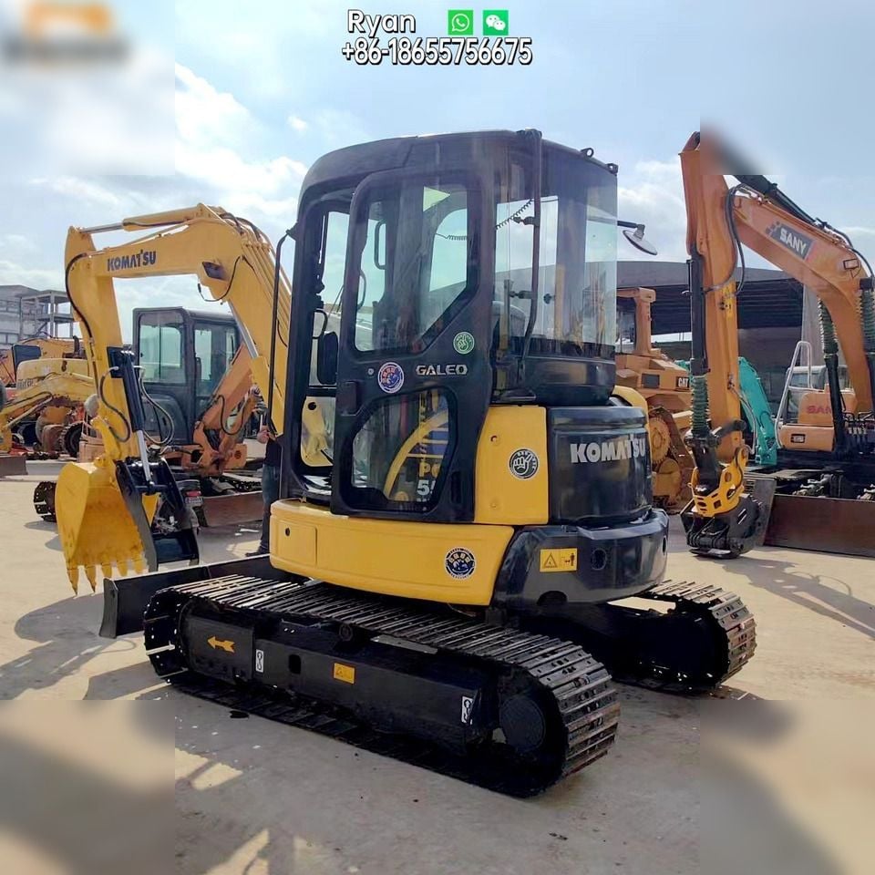 Komatsu PC55MR-2 mini excavator, front three-quarter view