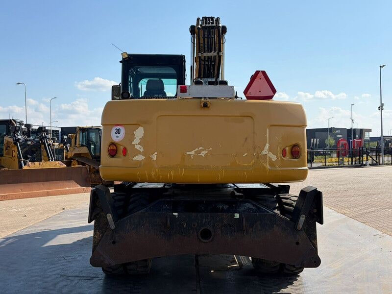 2012 Caterpillar M313D wheel excavator rear view