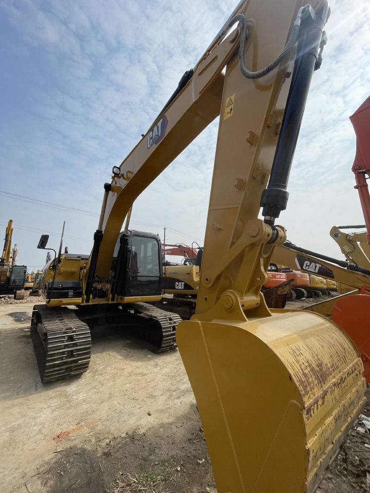 2023 Caterpillar 315D crawler excavator, front three-quarter view