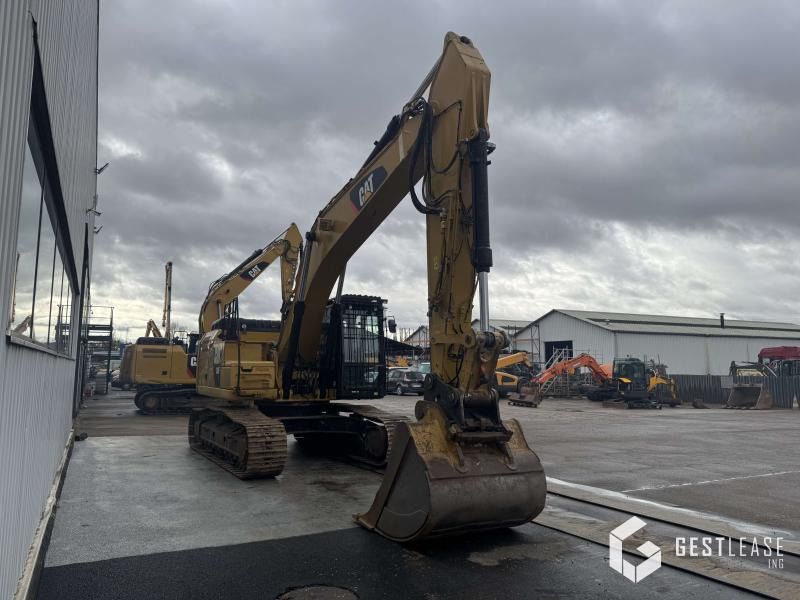 2019 Caterpillar 330FLN crawler excavator, front three-quarter view