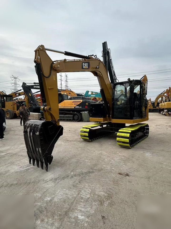 2025 Caterpillar 307.5 crawler excavator, front three-quarter view