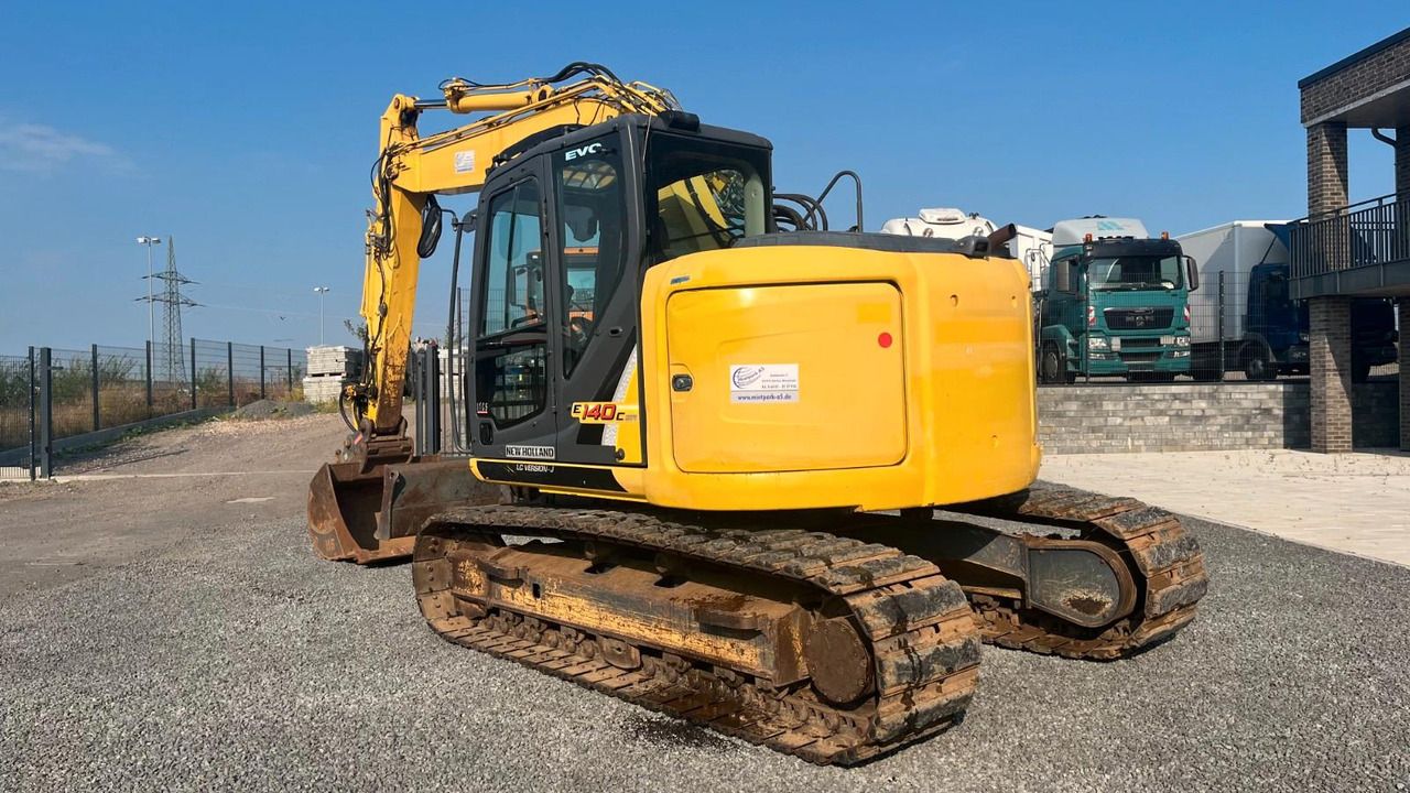 2016 New Holland E140CSR crawler excavator, rear three-quarter view